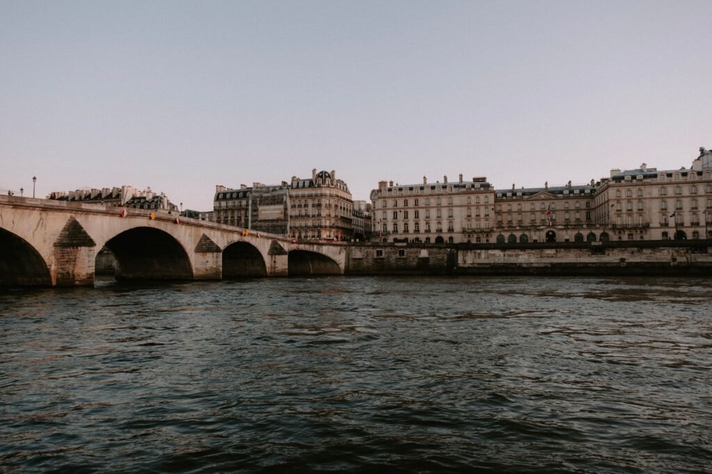 JR Conjures a Mountainous Illusion Out of the Pont Neuf in Paris