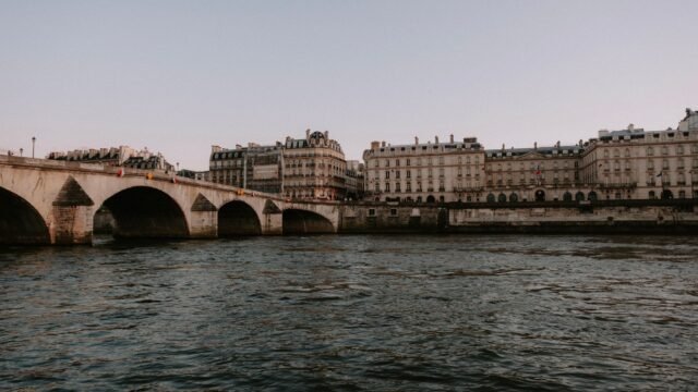 JR Conjures a Mountainous Illusion Out of the Pont Neuf in Paris