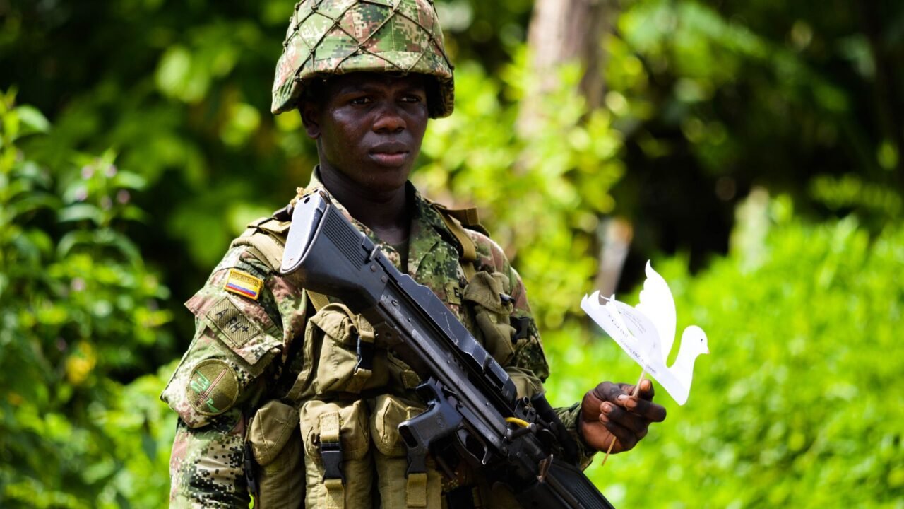 Colombian President Displays Firearm During Visit to City Under Lockdown